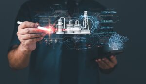 Hand zeigt digitale Industrieprozesse mit Sensorik | Drucksensoren